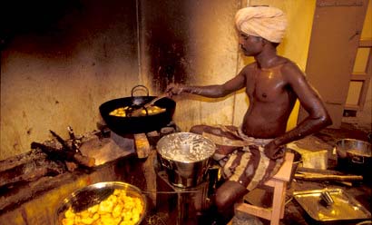 How is a cook selected in Kalayur village